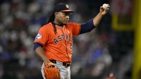 Houston Astros starting pitcher Framber Valdez (59) motions for a new ball during the sixth inning against the Texas Rangers at Globe Life Field. Mandatory Credit: Jerome Miron-Imagn Images