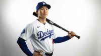 Los Angeles Dodgers infielder Hyeseong Kim poses for a portrait during photo day at Camelback Ranch.