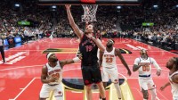 Toronto Raptors center Jakob Poeltl (19) drives to the basket during the first half against the New York Knicks at the 2025-26 NBA Emirates Cup at Scotiabank Arena.