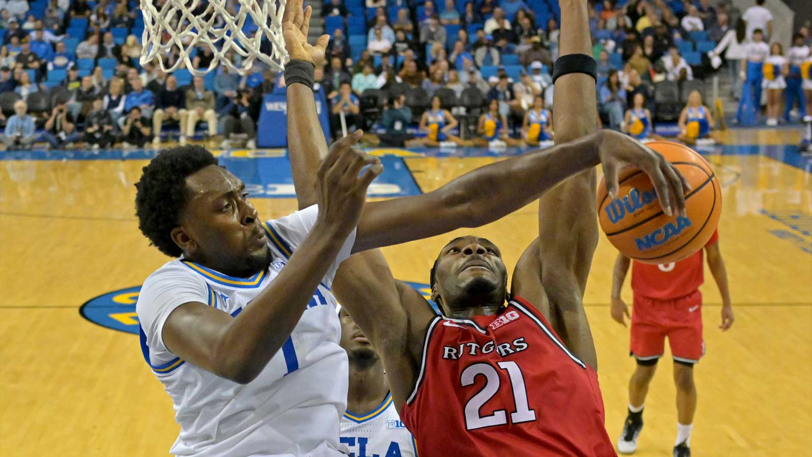 Rutgers Scarlet Knights guard Darren Buchanan Jr. (5) shoots over UCLA Bruins forward Xavier Booker (1) in the second half at Pauley Pavilion presented by Wescom Financial.