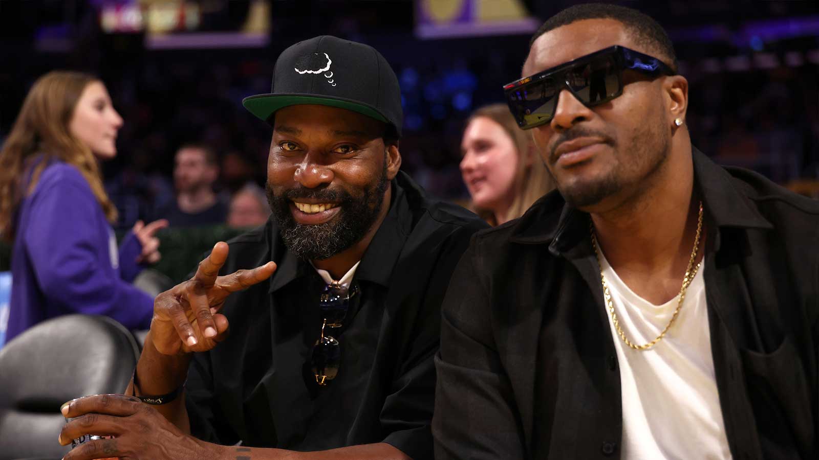 Former NBA player Baron Davis (left) attends the WNBA game between the Los Angeles Sparks and the New York Liberty at Cripto.com Arena.