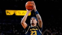 Michigan forward Yaxel Lendeborg (23) attempts a free throw against Wisconsin during the second half at Crisler Center in Ann Arbor on Saturday, Jan. 10, 2026.