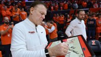 Illinois Fighting Illini head coach Brad Underwood prepares his game plan before tip-off against the Northwestern Wildcats at State Farm Center.