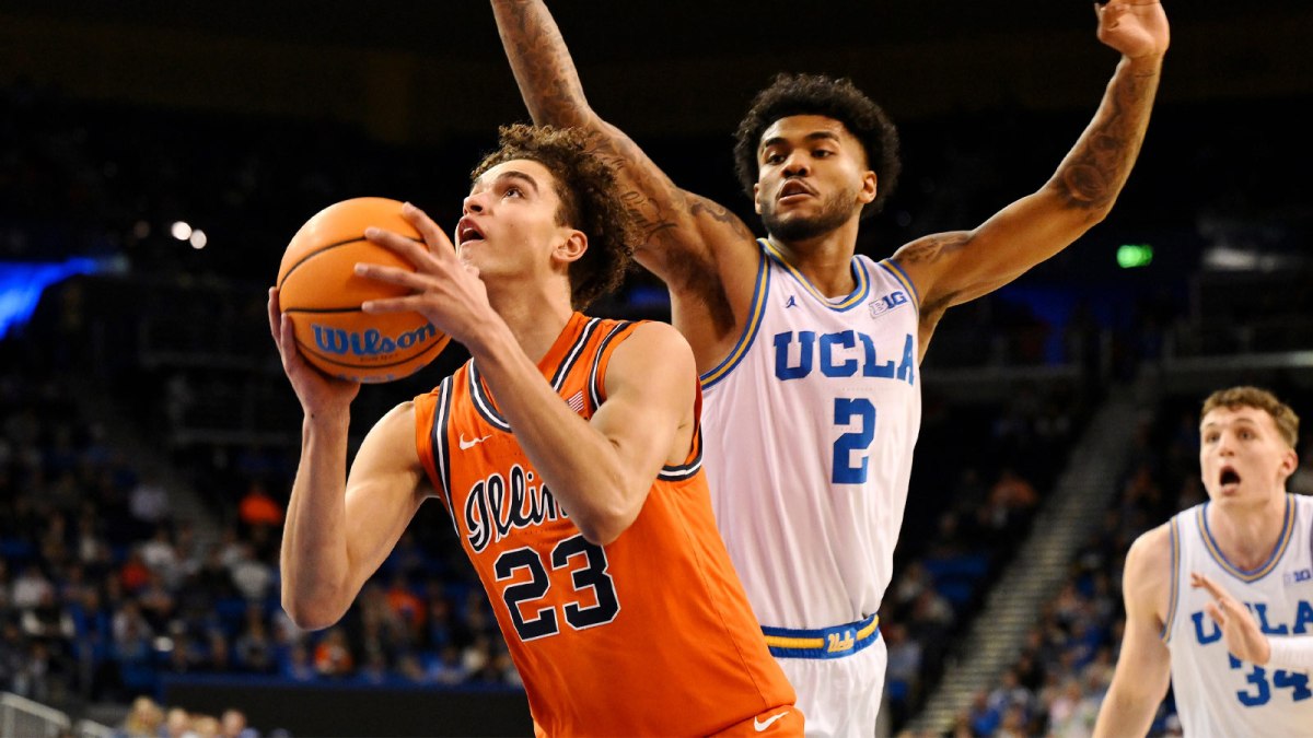 Illinois guard Keaton Wagler (23) drives to the basket past UCLA guard Donovan Dent (2) during the second half at Pauley Pavilion presented by Wescom Financial.