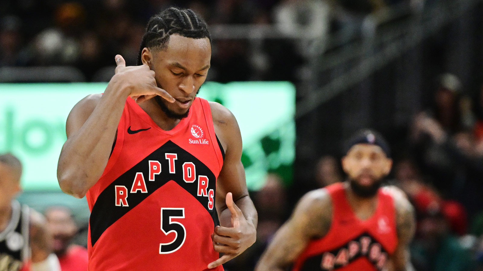 Toronto Raptors guard Immanuel Quickley (5) reacts after scoring a 3-point basket against the Milwaukee Bucks in the third quarter at Fiserv Forum. 