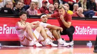 Iowa State Cyclones head coach T.J. Otzelberger, guard Tamin Lipsey (3) and guard Nate Heise (0) watch the Cyclones play the West Virginia Mountaineers during the second half at James H. Hilton Coliseum.