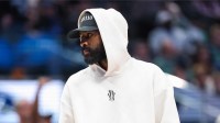 Dallas Mavericks guard Kyrie Irving looks on during the second half against the Minnesota Timberwolves at American Airlines Center.