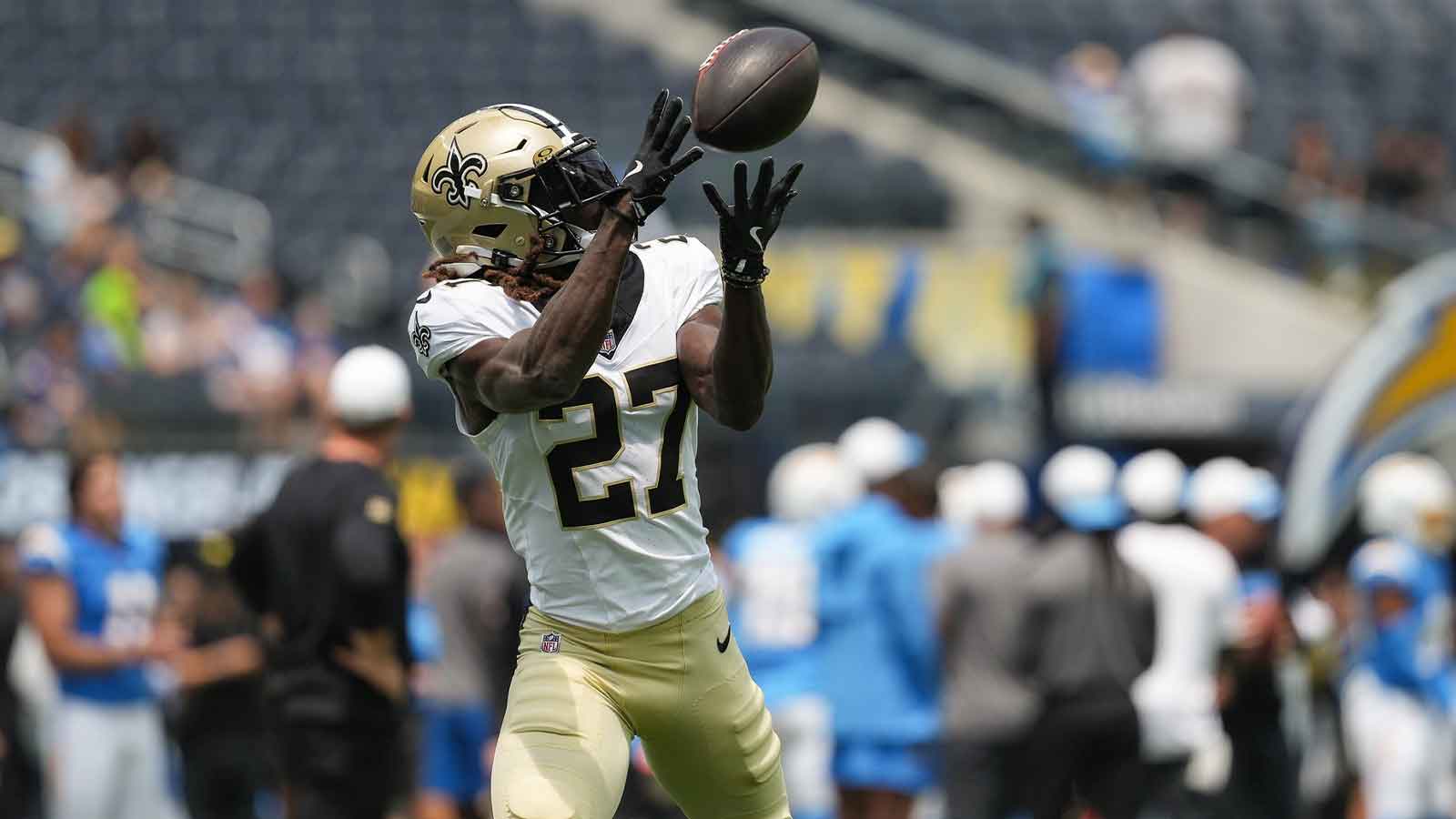 New Orleans Saints cornerback Isaac Yiadom (27) makes a catch during pre game warmups before a game against the Los Angeles Chargers at SoFi Stadium.