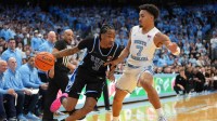 Duke Blue Devils guard Isaiah Evans (3) with the ball as North Carolina Tar Heels guard Seth Trimble (7) defends in the first half at Dean E. Smith Center.