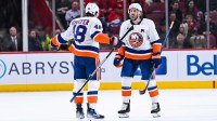 New York Islanders defenseman Matthew Schaefer (48) reacts after scoring his second goal of the game against the Montreal Canadiens during the second period at Bell Centre.