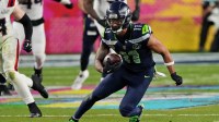 Seattle Seahawks wide receiver Jaxon Smith-Njigba (11) runs the ball during the third quarter against the New England Patriots in Super Bowl LX at Levi's Stadium