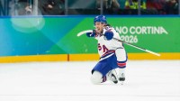 Jack Hughes (86) of the United States celebrates after scoring a goal during the second period against Slovakia in a men's ice hockey semifinal during the Milano Cortina 2026 Olympic Winter Games at Milano Santagiulia Ice Hockey Arena.