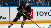 Vancouver Canucks forward Jake DeBrusk (74) handles the puck against the Toronto Maple Leafs in the second period at Rogers Arena.