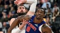 Detroit Pistons center Jalen Duren (0) battles for position on a foul shot with Denver Nuggets center Jonas Valanciunas (17) in the third quarter at Little Caesars Arena.