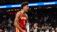 Atlanta Hawks forward Jalen Johnson (1) reacts after a basket against the Brooklyn Nets during the second half at State Farm Arena.