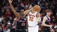 Feb 22, 2026; Chicago, Illinois, USA; New York Knicks center Karl-Anthony Towns (32) is defended by Chicago Bulls forward Jalen Smith (25) during the first half at United Center. Mandatory Credit: Kamil Krzaczynski-Imagn Images