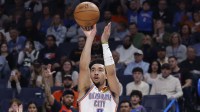 Oklahoma City Thunder guard Jared McCain (3) shoots a three point basket against the Milwaukee Bucks during the second half at Paycom Center. Mandatory Credit: Alonzo Adams-Imagn Images