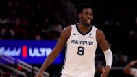 Memphis Grizzlies forward Jaren Jackson Jr. (8) reacts after a made basket against the Houston Rockets during the second quarter at Toyota Center.