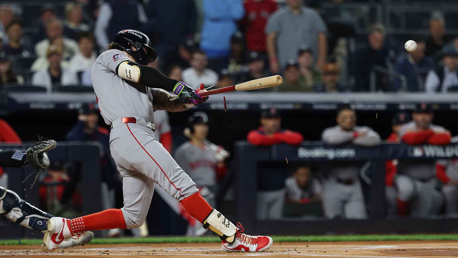 Boston Red Sox outfielder Jarren Duran (16) breaks his bat as he lines out during the first inning against the New York Yankees during game three of the Wildcard round for the 2025 MLB playoffs at Yankee Stadium