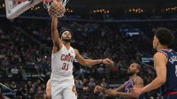 Cleveland Cavaliers center Jarrett Allen (31) gets past Los Angeles Clippers forward Kawhi Leonard (2) for a dunk in the first half at Intuit Dome.