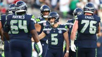 Seattle Seahawks place kicker Jason Myers (5) reacts with teammates after kicking a field goal against the New England Patriots during the second quarter in Super Bowl LX at Levi's Stadium.