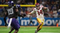 Southern California Trojans quarterback Jayden Maiava (14) carries the ball against the TCU Horned Frogs in the second half during the Alamo Bowl at Alamodome.