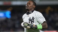 New York Yankees second baseman Jazz Chisholm Jr. (13) runs of the field between innings during game three of the Wildcard round for the 2025 MLB playoffs against the Boston Red Sox at Yankee Stadium.