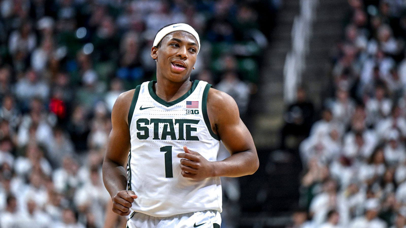 Michigan State's Jeremy Fears Jr. looks at Colgate's bench after his steal and score during the first half on Monday, Nov. 3, 2025, at the Breslin Center in East Lansing.
