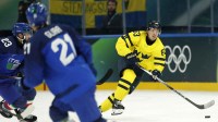 Jesper Bratt of Sweden in action against Italy in men's ice hockey group B play during the Milano Cortina 2026 Olympic Winter Games at Milano Santagiulia Ice Hockey Arena