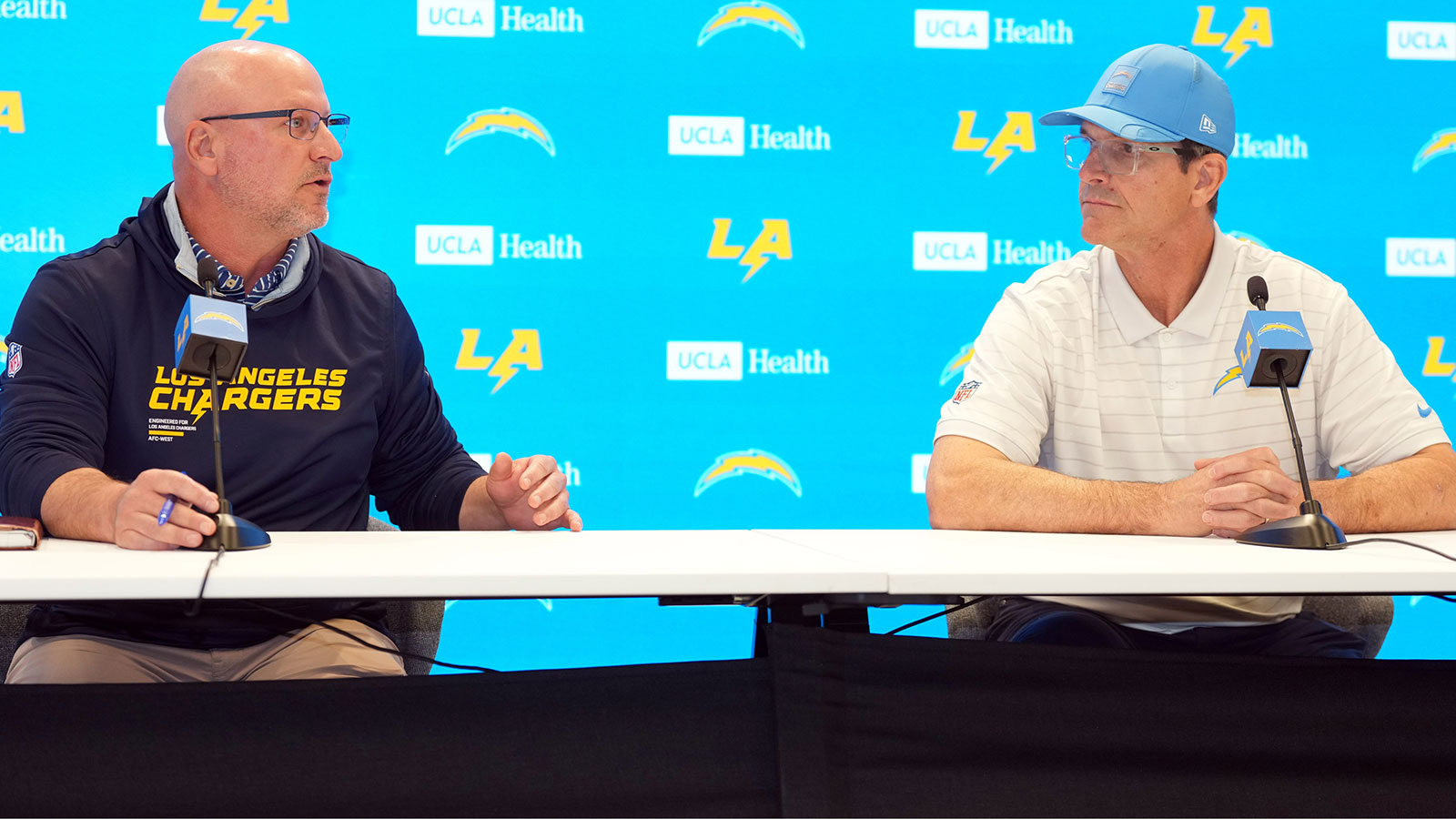 https://wp.clutchpoints.com/wp-content/uploads/2026/02/Jim-Harbaugh-and-Joe-Hortiz-1.jpg