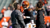 Cincinnati Bengals quarterback Joe Flacco (16) catches up with former teammates before the first quarter of the NFL Week 18 game between the Cincinnati Bengals and the Cleveland Browns at Paycor Stadium in Downtown Cincinnati on Sunday, Jan. 4, 2026.