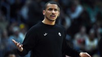 Boston Celtics Joe Mazzulla yells toward a referee during the first half against the Denver Nuggets at Ball Arena.