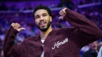 Boston Celtics forward Jayson Tatum reacts during introductions during a game against the New Orleans Pelicans at Smoothie King Center.