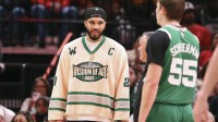 Boston Celtics forward Jayson Tatum stands on the court during the game against the Houston Rockets at Toyota Center.