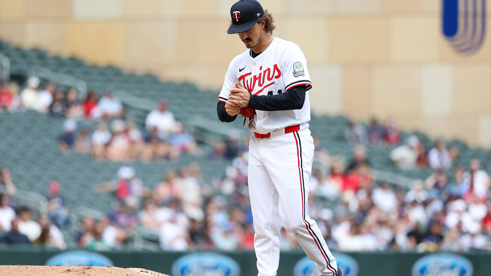 Minnesota Twins starting pitcher Joe Ryan (41) reacts to Cleveland Guardians third baseman Daniel Schneemann’s (10) solo home run during the fifth inning of game one of a double header at Target Field