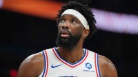 Philadelphia 76ers center Joel Embiid (21) reacts against the Phoenix Suns during the first half of an NBA game at Mortgage Matchup Center.