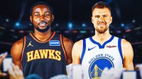 Jonathan Kuminga in Hawks' jersey next to Kristaps Porzingis in Warriors' jersey