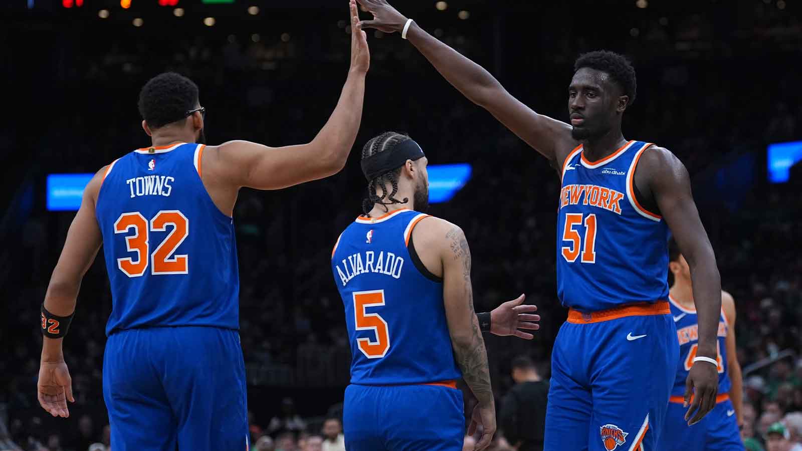 New York Knicks forward Mohamed Diawara (51) and center Karl-Anthony Towns (32) react after a play against the Boston Celtics in the second quarter at TD Garden.