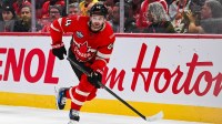 Team Canada defenseman Josh Morrissey (44) plays the puck against Team Sweden in the second period during a 4 Nations Face-Off ice hockey game at Bell Centre.