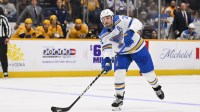 St. Louis Blues defenseman Justin Faulk (72) takes a shot on goal against the Nashville Predators during the third period at Bridgestone Arena.