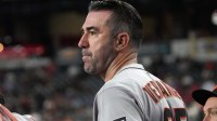 San Francisco Giants pitcher Justin Verlander (35) watches from the dugout after pitching 7 innings against the Arizona Diamondbacks at Chase Field.