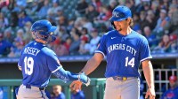 Kansas City Royals right fielder Jac Caglianone (14) scored on a two-run home run by second baseman Michael Massey (19) in the second inning against the Texas Rangers at Surprise Stadium.