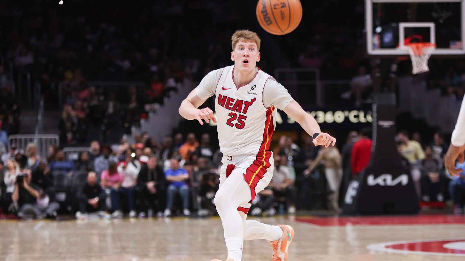 Miami Heat guard Kasparas Jakucionis (25) goes for a loose ball against the Atlanta Hawks in the first quarter at State Farm Arena.