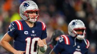 New England Patriots quarterback Drake Maye (10) and wide receiver Kayshon Boutte (9) run off the field after a Patriots touchdown against the Miami Dolphins during the second half at Gillette Stadium. Mandatory Credit: David Butler II-Imagn Images