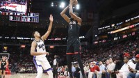Houston Rockets forward Kevin Durant (7) shoots the ball as Sacramento Kings forward Keegan Murray (13) defends during the first quarter at Toyota Center. Mandatory Credit: Troy Taormina-Imagn Images