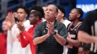 Houston Cougars head coach Kelvin Sampson applauds a play against Kansas Jayhawks during the game inside Allen Fieldhouse on Monday, Feb. 23, 2026.