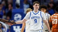 Kentucky Wildcats forward Trent Noah (9) fives guard Denzel Aberdeen during the second half against the Texas Longhorns at Rupp Arena at Central Bank Center.