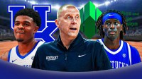 Kentucky HC Mark Pope (center) with Kentucky SF Otega Oweh and Kentucky PG Denzel Aberdeen. Kentucky Wildcats logo and SEC logo behind them.