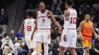 Houston Rockets forward Kevin Durant (7)reacts with forward Jabari Smith Jr. (10) after a foul call during the second quarter against the Charlotte Hornets at Spectrum Center.