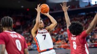Auburn Tigers forward Keyshawn Hall (7) takes a jump shot over Alabama Crimson Tide forward London Jemison (6) as Auburn Tigers take on Alabama Crimson Tide at Neville Arena in Auburn, Ala. on Saturday, Feb. 7, 2026. Alabama Crimson Tide defeated Auburn Tigers 96-92.